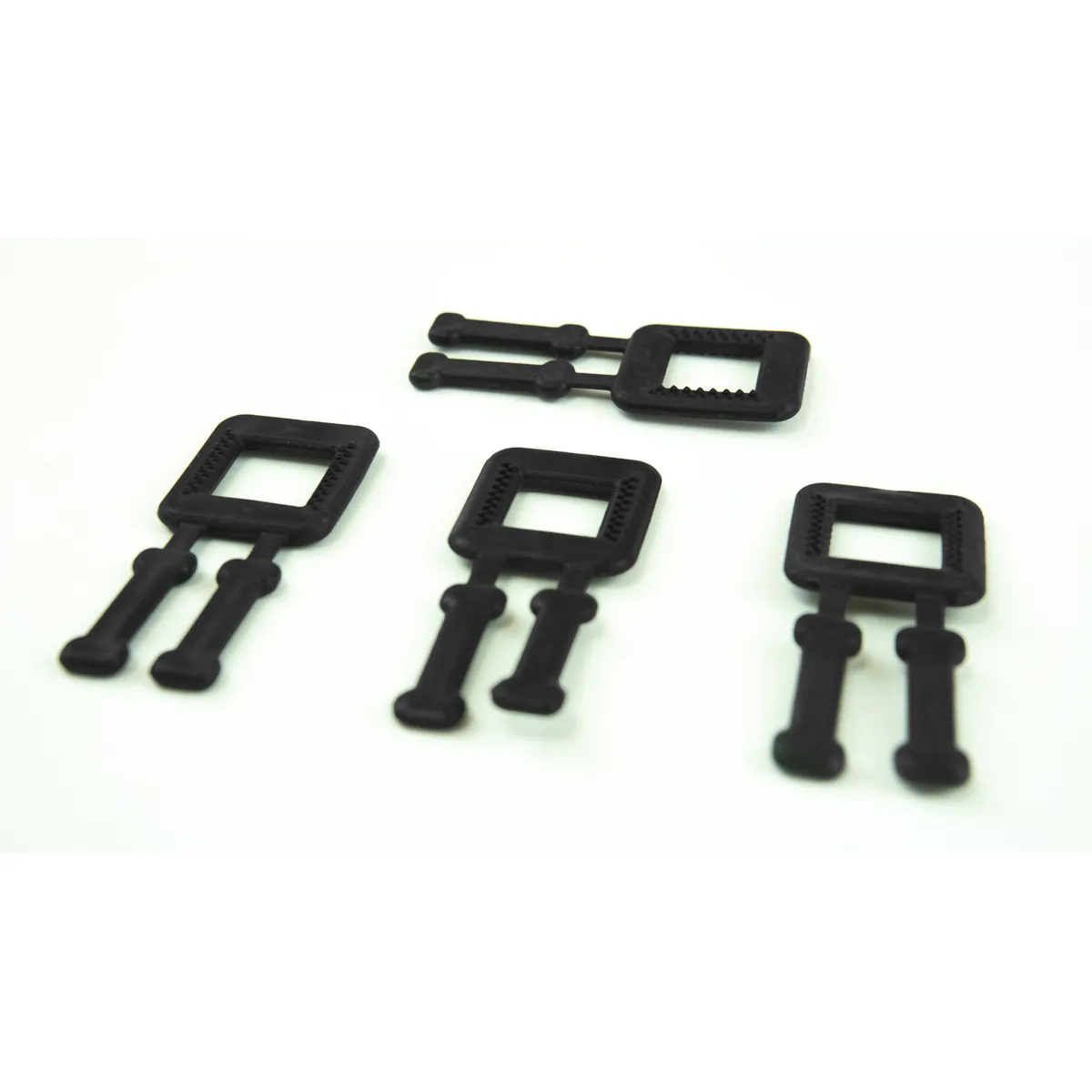 Detail černých plastových spon BUCKLES-4P pro 12mm PP pásku